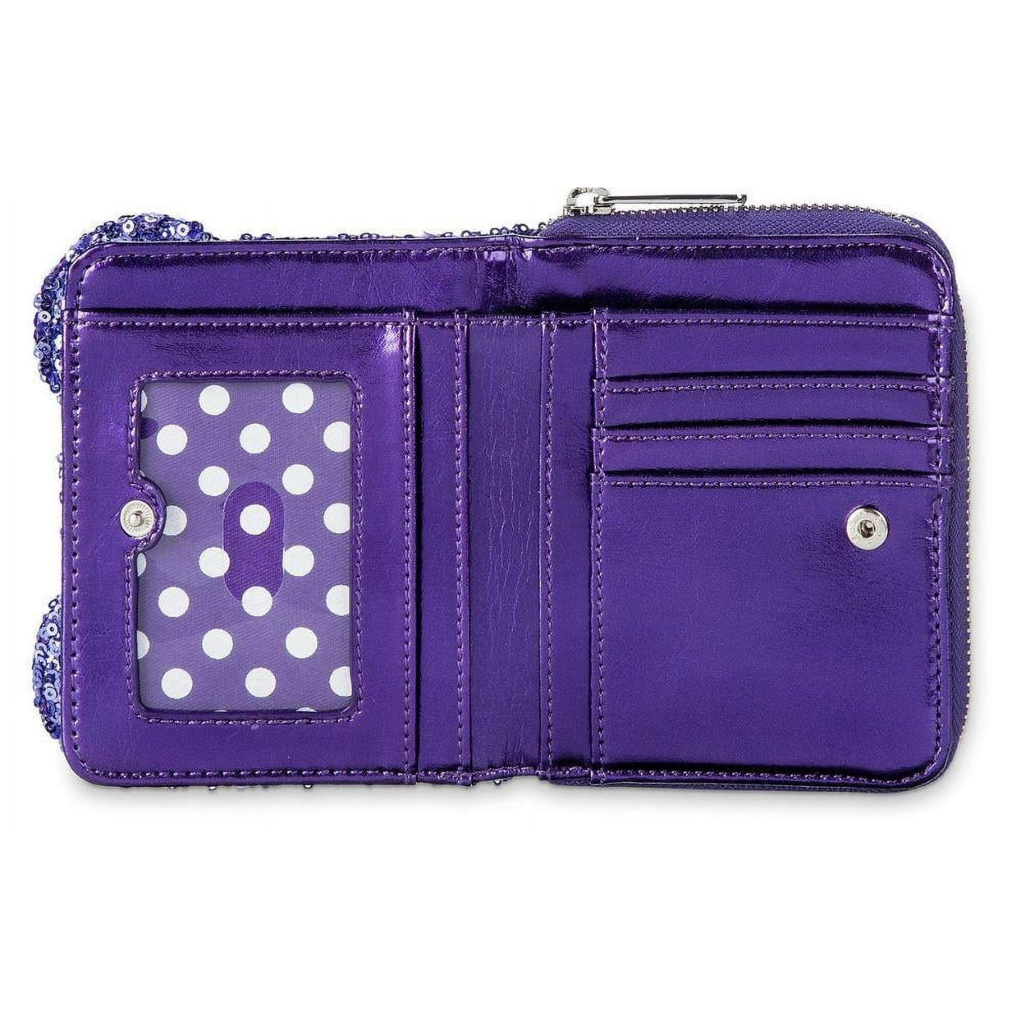 Purple wallet with a polka dot card holder on a white background