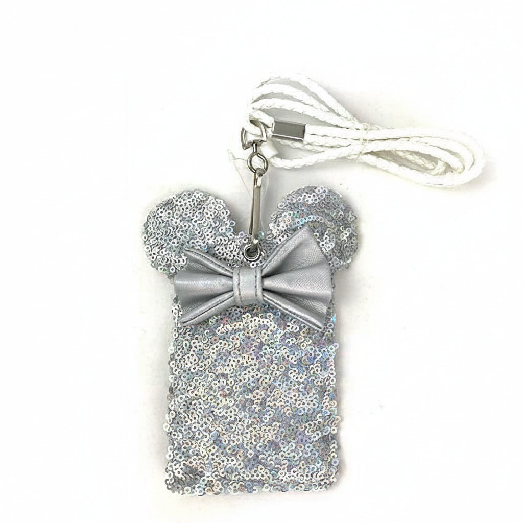 Silver sequin phone case with a bow and lanyard on a white background