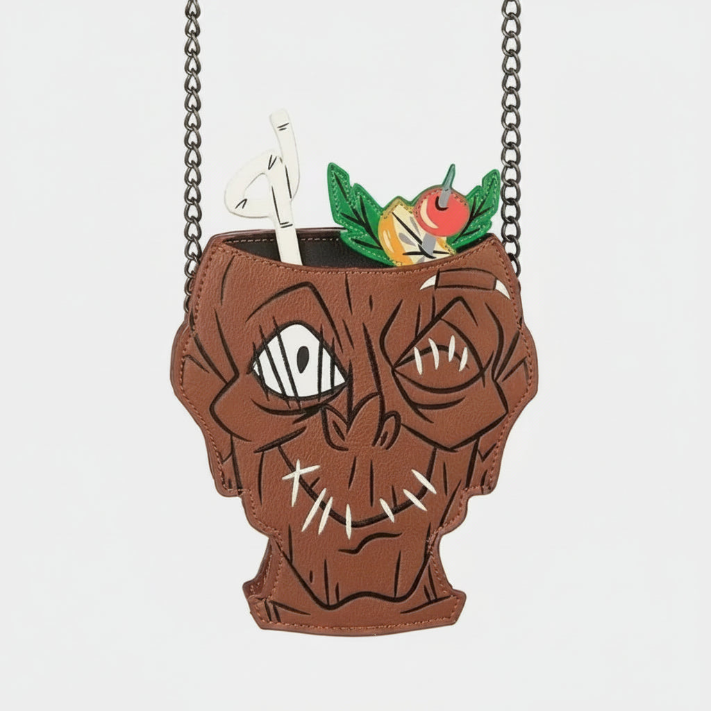 Leather bag shaped like a character with a face, eyes, and a mouth on a white background.