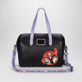Black handbag with a red and white design on a white background