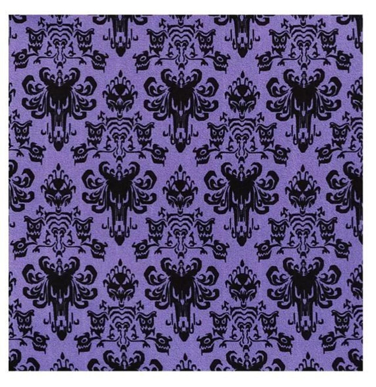 Black pattern of skulls and bats on a purple background