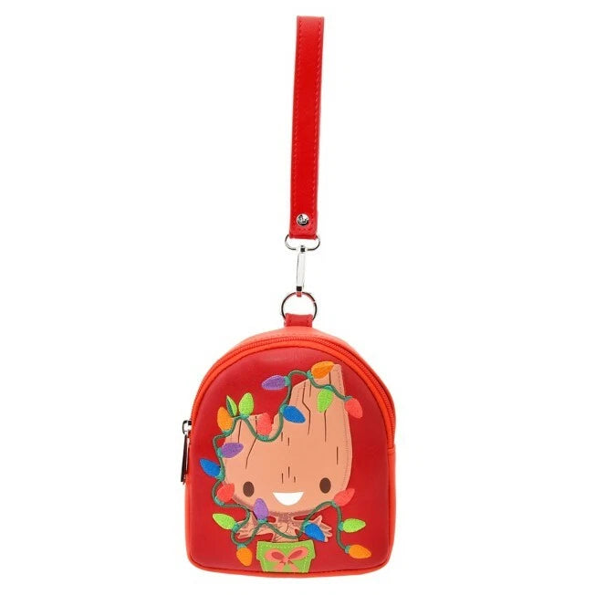 Red backpack with a Baby Grootwearing Christmas lights on a white background