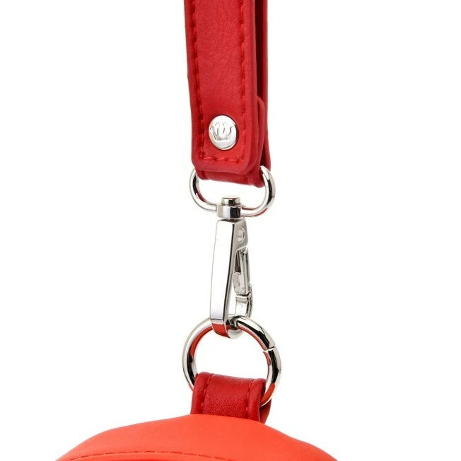 Close-up of a red strap with a silver clasp on a white background