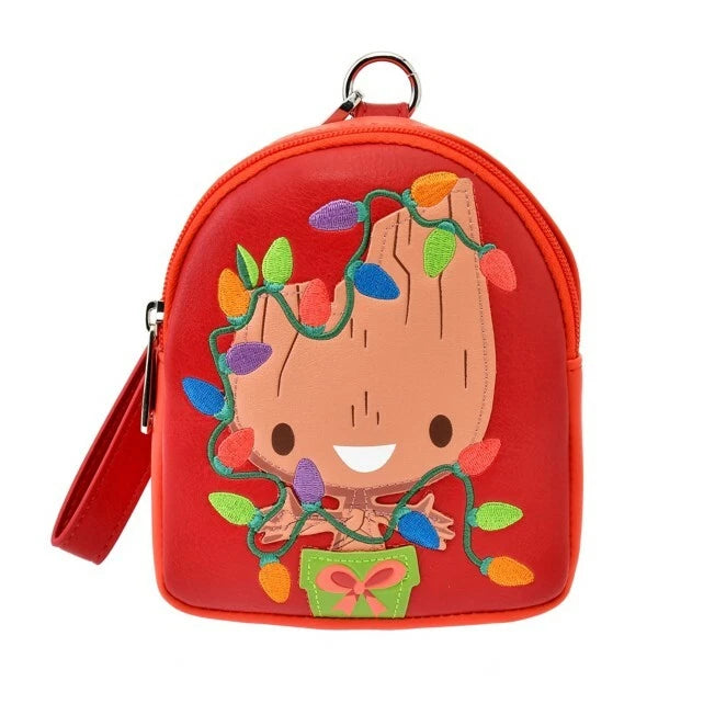 Red backpack with a Baby Groot wrapped in Christmas lights on a white background